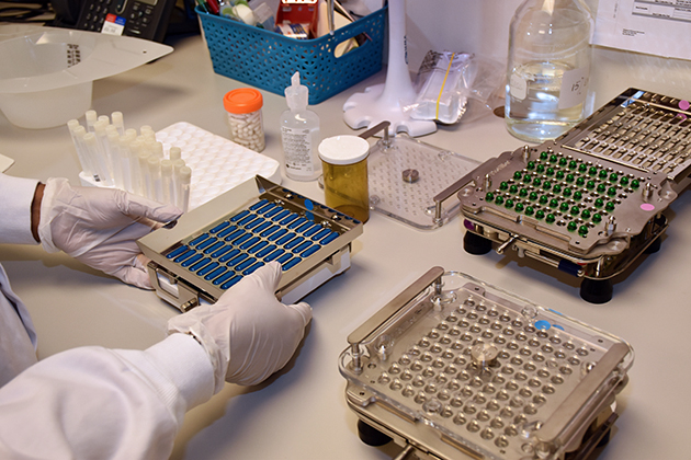 Fecal transplant capsules being prepared in lab