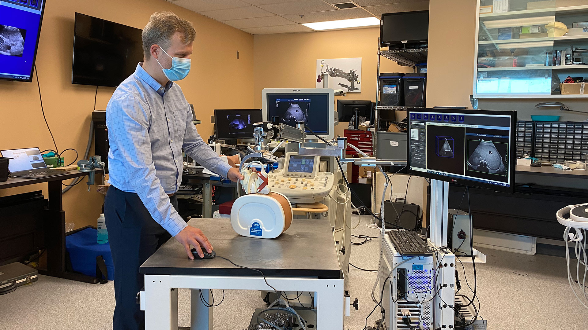 Dr. Derek Cool demonstrates the 3D ultrasound device at the Robarts Research Institute at Western University in London, Ont.