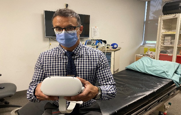 Dr. Naveen Poonai with the VR device 