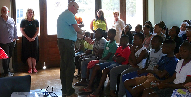 Dr. Gregor Reid presents to students in South Africa