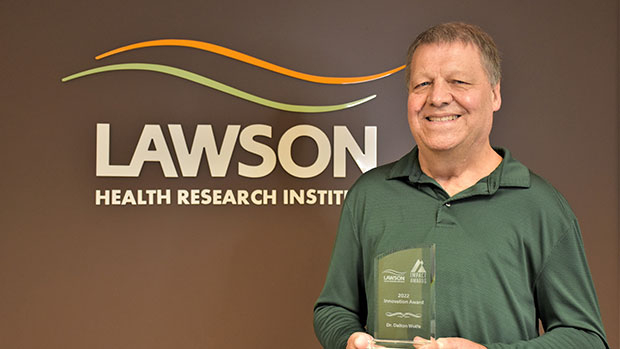 Dr. Dalton Wolfe with his award 