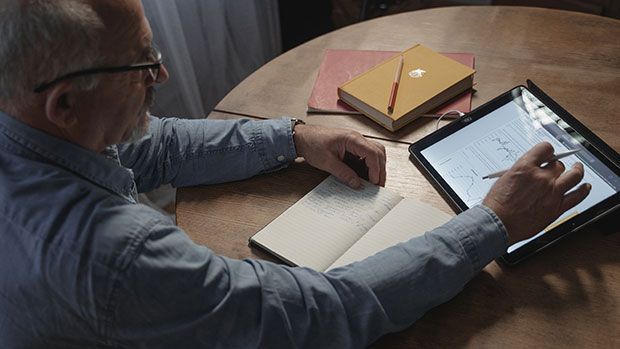 Older man using a tablet